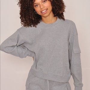 LONG SLEEVE WAFFLE 1 POCKET SLEEVE DETAIL TOP